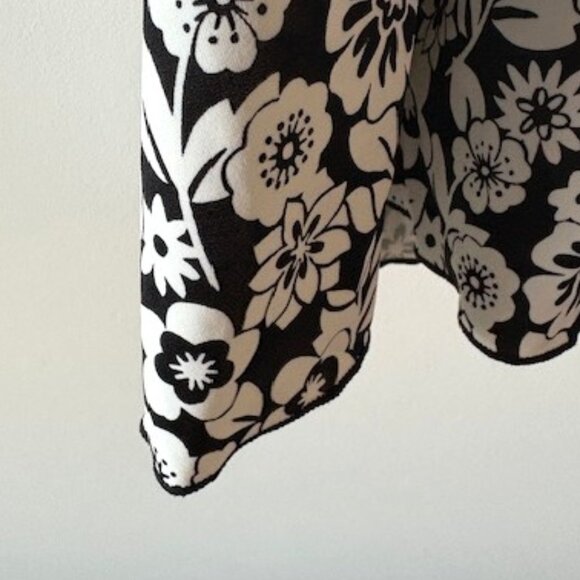 A Shore Fit Black and White One-Piece Bathing Suit Dress with Adjustable Straps - Picture 3 of 7